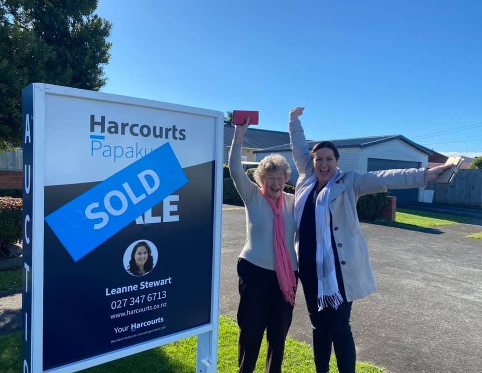 Leanne Stewart celebrating a sale