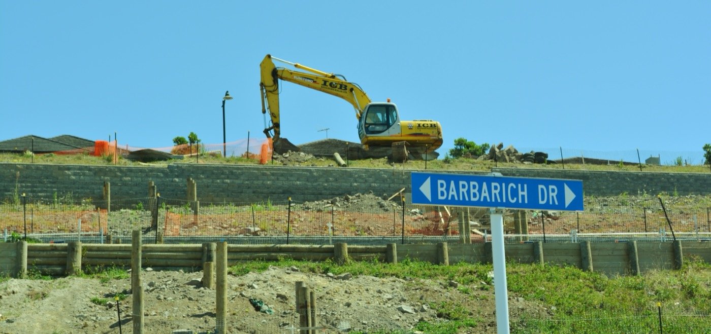 Heavy excavator carrying out earthworks at Mount Wellington, 2014
